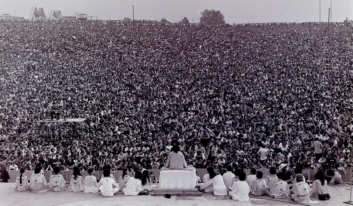 Opening ceremony at Woodstock. Swami Satchidananda giving the opening speech (photo: Wikipedia/Mark Goff)